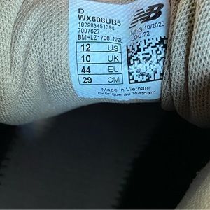 Women’s 608 New Balance Sneakers. Never worn. Size 12 wide. Need sole inserts.